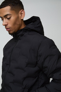 Chaqueta acolchada gruesa con aislamiento térmico, diseñada para protección en invierno al aire libre, con relleno suave y tejido transpirable. - Product Image 5