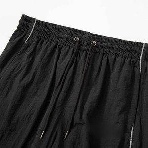 ชุดวอร์มเทคฟลีซผู้ชาย ผ้าไนลอนกันลม แต่งแถบสะท้อนแสง ปักโลโก้ - Product Image 4