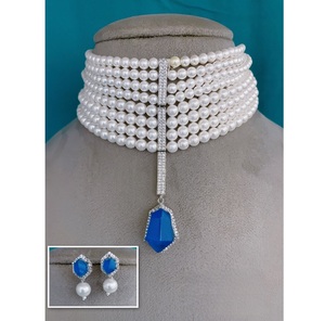 Conjunto de Gargantilla y Aretes con Perlas de Circonita Cúbica con Acabado Étnico de Precisión y Estilo Premium, Color Plateado, para Fiestas y Bodas, Colección para Mujer - Product Image 1