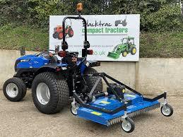 Tractor de orugas diésel azul industrial 4x4 con transmisión por engranajes, cortacésped utilitario con bomba OEM para paisajismo agrícola - Product Image 4
