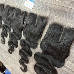 Haute qualité Dentelle Vietnamien Cheveux humains Naturel Ondulé Double Dessiné Dentelle Fermeture Frontale Transparent Suisse HD Extensions de Cheveux - Product Image 1