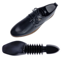 Chaussure en plastique de prix usine Shaper arbre à chaussures réglable télescopique pour hommes et femmes civière de soutien de chaussure