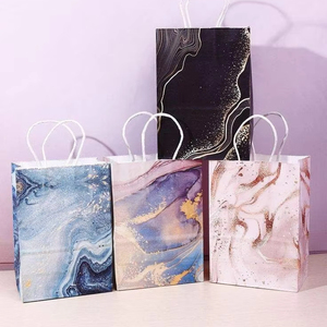 Sacs en papier de haute qualité de style sac à main à motif floral pour l'emballage de vêtements et de cadeaux, vente en gros en usine - Product Image 1