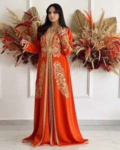 Vente en gros de robe caftan de Dubaï en cristal brodée orange de luxe, travail manuel personnalisé, caftan marocain musulman avec belle ceinture