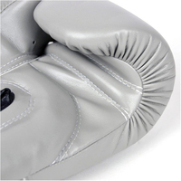 Nouvelle arrivée de gants de boxe en cuir de haute qualité dans un style tendance dernier design meilleurs matériaux fabriqués à partir de gants de boxe de toutes les couleurs