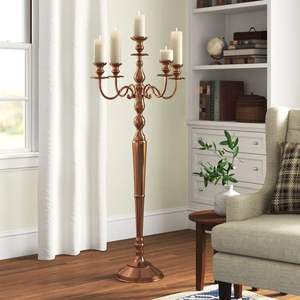 Elegante candelabro de cobre para suelo con 5 luces. Disponible a precios de mayorista. - Product Image 1
