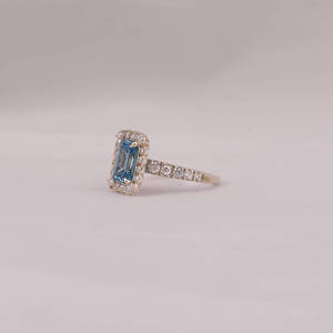 Fashionable Solitaire Blue Emerald Cut Lab Grown Diamond With Tiny Round Cut Diamond Halo Engagement Ring in 18KT <b>Solid</b> Gold - Product Image 2