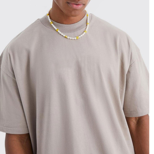 เสื้อยืดทรงบ็อกซี่สำหรับผู้ชายจากผู้ผลิต ผ้าฝ้าย 100% กันยับ คอกลม เย็บตะเข็บตัดกัน ทรงโอเวอร์ไซส์ บริการ OEM ผลิตตามสั่ง ผ้า Worsted - Product Image 6