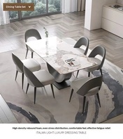 Ensemble de table à manger stable en pierre frittée de luxe 6 places avec base créative en acier au carbone en forme de U pour salon moderne