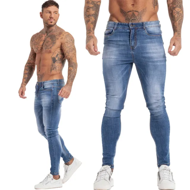 Jeans da uomo con strass Hip Hop Stretch pantaloni Jeans in Denim di cotone Skinny dipinti retrò da uomo strappati alla moda
