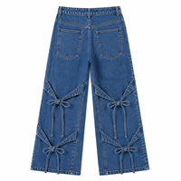 Jean ample taille haute pour femme style Y2K avec détail noué, coupe décontractée, denim délavé clair, écologique et respirant, idéal pour l'été