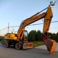Excavatrice sur roues Hyundai R210W de 21 tonnes, moteur Cummins B5.9 C, d'occasion, pour travaux de construction et réparation routière en Corée.