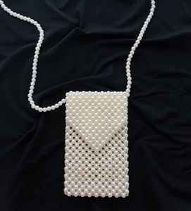 Sac de rangement en plastique moderne avec perles d'ivoire |   Sac à main et sac à bandoulière artisanal de grande capacité |   Armoire applicable - Product Image 1