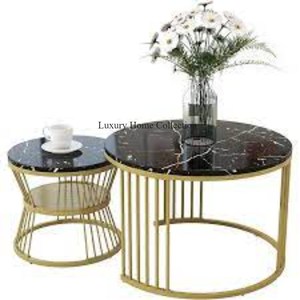 Juego de 2 mesas anidadas de metal a precio barato, forma redonda de Color dorado con forma redonda, tapa de mármol compuesto de Color negro de la India - Product Image 1