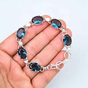 Pulsera refinada de Topacio Azul de Londres en plata de ley 925, piedra preciosa facetada ovalada, joyería hecha a mano ajustable para mujer - Product Image 1