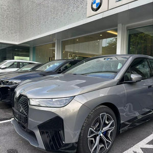 BMW iX xDrive50 2024, Caja de Cambios Automática, Interior Oscuro, Asientos de Cuero, Volante a la Izquierda/Derecha, Auto Usado, Eléctrico - Product Image 1