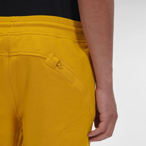 Short tendance en molleton jaune avec logo personnalisé pour hommes, streetwear longueur genou, style décontracté avec cordon de serrage, teint uni, service OEM - Product Image 1