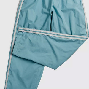 Pantalon coupe-vent évasé pour femmes en toile à boutons personnalisés en gros avec tissu imperméable et respirant - Product Image 6