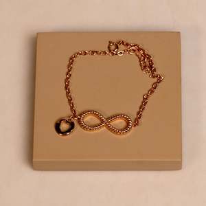 Pulsera de Plata de Ley con Dije Infinito en Oro Rosa - Product Image 1