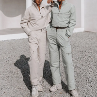 Ensemble jogging streetwear deux pièces pour femme, veste courte légère à demi-zip et pantalon, collection Hiver 2024