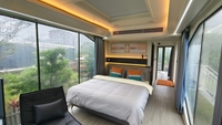 Maison mobile intelligente de luxe préfabriquée avec terrasse, lit, salle de bain, capsule, mini-maison avec acier et panneau sandwich