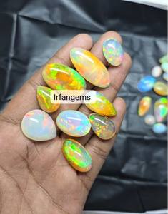 Superfine Quality Calibrated Oval Shape <b>Fire</b> Ethiopian Opal Cabochons Natural Ethiopian Opal Wholesale Natural Gemstone Lot Opal - Product Image 5