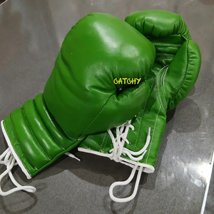 นวมชกมวยหนังพรีเมียมพร้อมสายรัดข้อมือ ดีไซน์ดูดซับแรงกระแทกสำหรับการฝึกซ้อมและการแข่งขัน - Product Image 3