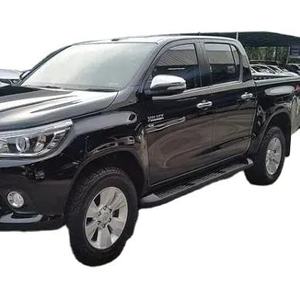 Pick-up électrique Hilux d'occasion, moteur turbo, traction avant, direction à gauche, intérieur foncé, sièges en cuir, double cabine, R16, 2021, automatique, feux LED - Product Image 1