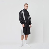 Coupe-vent sportif tendance en nylon uni pour homme avec bandes réfléchissantes sur les épaules, empiècements contrastants, fermeture éclair et séchage rapide