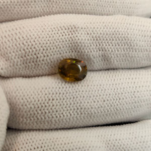 Piedra de corte ovalado de piedra preciosa suelta de esfene de titanita natural para la fabricación de joyas - Product Image 1