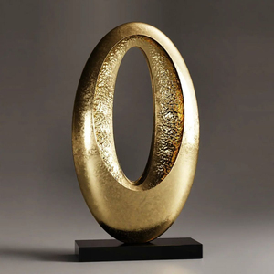 รูปปั้นรูปไข่โลหะสีทองคลาสสิกพร้อมพื้นผิวและฐานสีดำสไตล์วินเทจรูปปั้นตกแต่งโต๊ะในสำนักงานที่บ้าน - Product Image 1