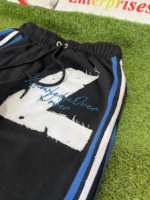 Pantalon baggy pour homme, coupe droite, style motard, avec bandes, effet usé, broderie appliquée, fabricant Wondrous Enterprises