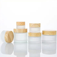 En Stock Gros Pot en Verre Mat Noir 5/10/20/30/50G pour Crème Visage et Laboratoire, Bouteille de Lotion en Plastique avec Couvercle en Plastique Imitation Bois