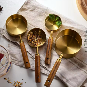 Gold Stainless Steel <b>Measuring</b> <b>Spoons</b> Set of 4 with Wooden Handle - Product Image 1