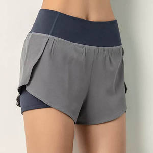 Pantalones cortos de yoga transpirables de cintura alta para mujer Venta al por mayor Pantalones cortos de entrenamiento de gimnasio sin costuras de cintura media Diseño de patrón sólido - Product Image 3