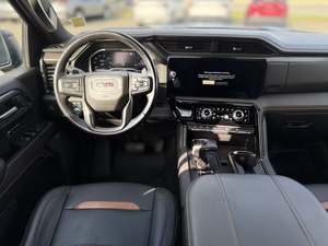 Super Blue 2024 GMC Sierra 1500 AT4 Crew Cab 4WD Techo Panorámico Arranque Remoto Asientos de Cuero Paquete Premium Cromado Izquierdo Oscuro - Product Image 5