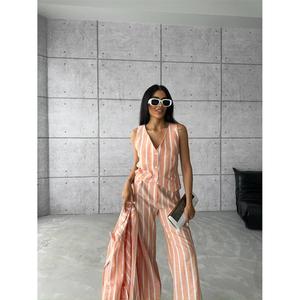 Ensemble veste et pantalon en lin rayé orange pour femmes - Product Image 1
