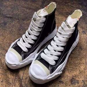 "รองเท้าผู้ชายสีดำผ้าใบต่ำ MMY ของผู้ชายรองเท้าลำลอง Maison Mihara Yasuhiro" - Product Image 1