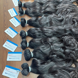 Cheveux vietnamiens bruts non traités vendeurs de cheveux de style ondulé naturel vierge paquets d'extensions de cheveux humains bruts alignés sur les cuticules - Product Image 2