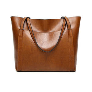 กระเป๋าถือหนังแท้ทรงเดี่ยว วัสดุทนทาน ขายดี น้ำหนักเบา กระเป๋าถือหนังแท้ทรงเดี่ยว ขายดี - Product Image 1