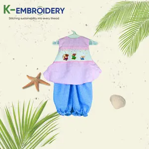 スモック子供服ピンクブルーソリッドスモッククマの装飾プレイスーツボディスーツ高品質子供服K-刺Embroidery