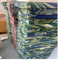 Carnets à couverture rigide en papier imprimé marbré faits à la main personnalisés avec impressions tourbillonnantes marbrées pour la revente