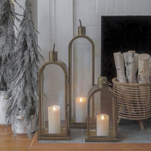 Vintage inspired iron <b>candle</b> <b>lantern</b> for indoor and <b>outdoor</b> use featuring clear glass windows and sturdy metal handle - Product Image 1