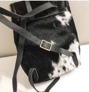 Mochila de viaje para pañales de piel de vaca real 100% con correa de cuero genuino Cierre de cremallera de estilo occidental Forro de moda - Product Image 3