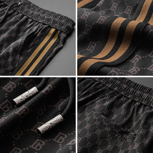 Stitchmode Presente Hot Summer Beach Pocket Shorts Logotipo bordado Pantalones cortos estampados para hombres Pantalones cortos para hombres - Product Image 1