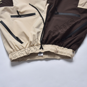 Pantalones de esquí impermeables con aislamiento de estilo súper holgado Unisex, pantalones de nieve de carga alta de pierna suelta, tela impermeable de nailon y poliéster 100% - Product Image 3