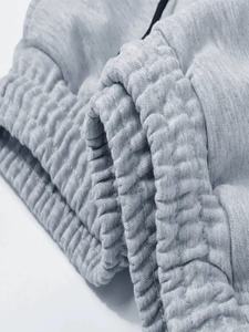 Pantalones deportivos ligeros y transpirables con logotipo personalizado para hombre y mujer, para correr, gimnasio, uso casual, con bolsillos con cremallera. - Product Image 3