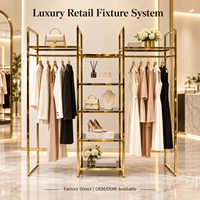 Système de présentoirs de luxe sur mesure en or pour vêtements, idéal pour les projets de boutiques, vente en gros directe usine OEM
