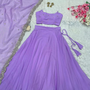 Diseño moderno de alta demanda Color lavanda Perla Trabajo Adornado Georgette Lehenga Choli & Dupatta Set para ropa de fiesta de mujer - Product Image 1