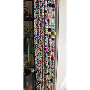 Bohemian Beaded Garland with Plastic Bells for Hanging Decor - Product Image 1